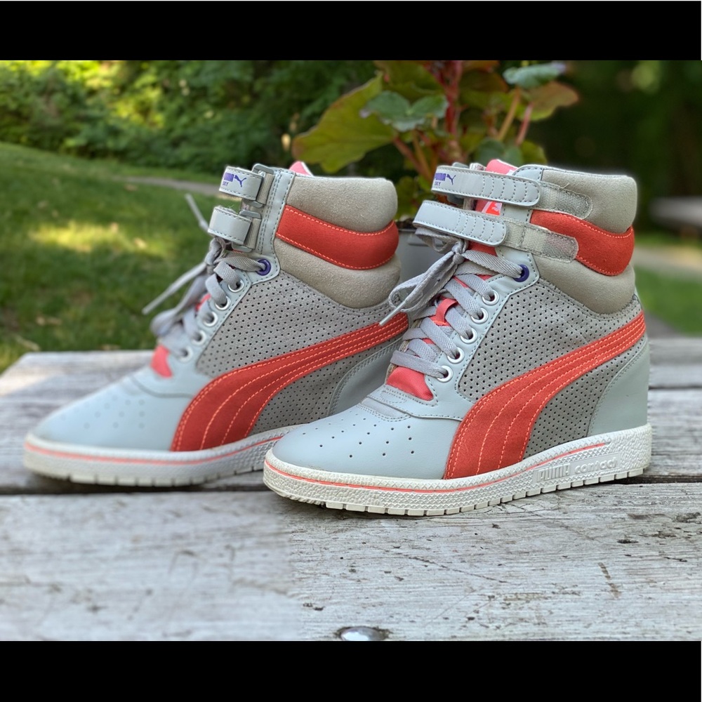 Puma sneakers size 6.5, pre owned.